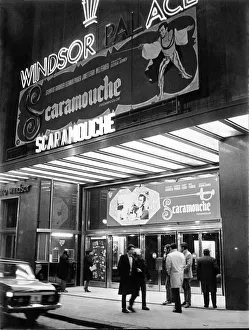 Facade of old cinema Windsor in Barcelona with neon signs advertising the film Scaromouche Facade of old cinema Windsor in Barcelona with neon signs advertising the film Scaromouche