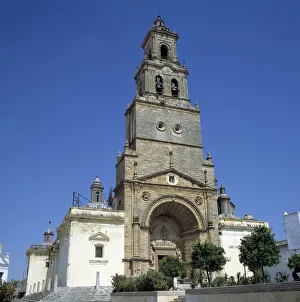 Santa Maria Prints: Facade and tower of the Church of Santa Maria de la Asuncion in Utrera (Sevilla)