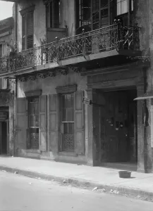 Balcony Rail Prints: Facades of buildings along a street in the French Quarter