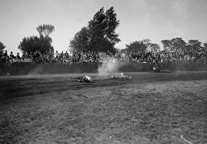 Speedway Prints: Fallen rider in a speedway race at Lea Bridge Stadium