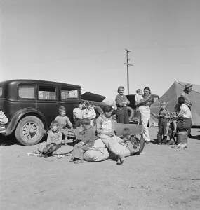 Workwear Prints: Families from the Dust Bowl in Texas in an overnight roadside camp near Calipatria