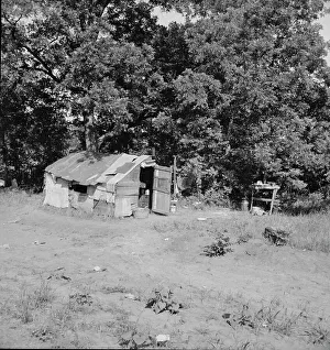 Makeshift Prints: Family camped on U.S. Highway 63, Cache County, Oklahoma, 1937. Creator: Dorothea Lange
