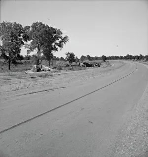 Camping Out Prints: Family camped on U.S. Highway 63, Cache County, Oklahoma, 1937. Creator: Dorothea Lange