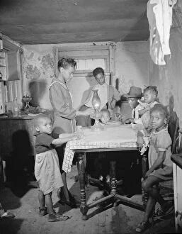 Living Conditions Gallery: A family which lives in the Southwest area, Washington, D.C. 1942. Creator: Gordon Parks
