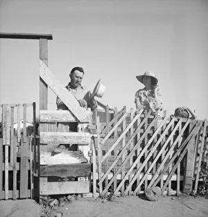 Family from Oklahoma, Highway City, near Fresno, California, 1939. Creator: Dorothea Lange