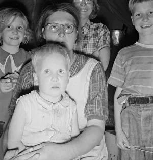 Family of six in tent after supper, FSA mobile unit, Merrill, Klamath County, Oregon, 1939 Creator: Dorothea Lange