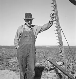 Dead Ox Flat Gallery: Farmer in his field getting ready to mow hay, Dead Ox Flat, Oregon, 1939. Creator: Dorothea Lange
