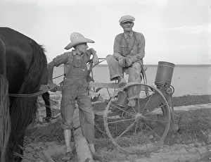 Farmer and son near Stanton, Texas, 1937. Creator: Dorothea Lange