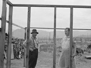 Braces Prints: Farmer starting out on cut-over land building