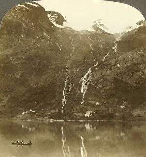 Underwood Travel Library Gallery: Farmhouses of Yri nestled at the mountains base - Yri falls on the glacier, Norway, c1905
