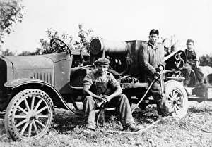 Hose Prints: Farmworkers with a tractor, (c1930s?)
