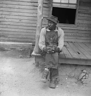 Resting Collection: Father of sharecropper family, Person County, North Carolina, 1939. Creator: Dorothea Lange