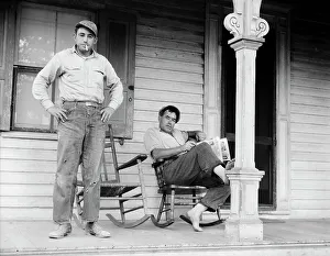 Jeans Prints: Father and son, idle American workman