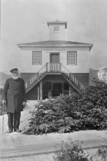 Sidewalk Collection: Father William Duncan, a missionary, in front of town library, between c1900 and 1923