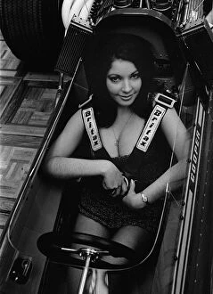 Motorshow Gallery: Female model in cockpit of Cooper F5000 at 1969 Racing Car show. Creator: Unknown