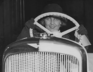 1933 Gallery: Female model in Hillman Minx at 1933 Motor Show. Creator: Unknown