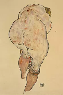 Stockings Collection: Female Nude Pulling up Stockings, Back View, 1918