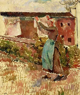 Washerwoman Prints: Femme étendant du linge, Éragny, c1887. Creator: Pissarro; Camille (1830-1903)