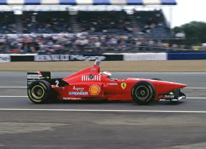 Ferrari Prints: Ferrari F310, Eddie Irvine, 1996 British Grand Prix, Silverstone. Creator: Unknown