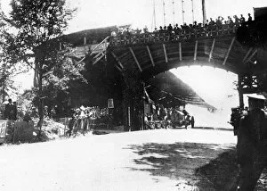 Onlookers Collection: FIAT of Luigi Storero going under a bridge during the 1904 Gordon Bennett Cup, Homburg
