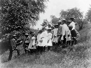 Field Trip Prints: Field-trip - school children outdoors listening to man