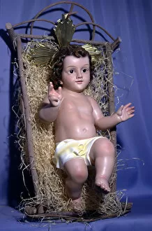 Figure of baby Jesus in the crib
