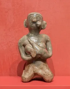Breastfeeding Gallery: Figurine of a Mother and Child, 14th / 16th century. Creator: Unknown
