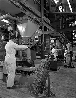 Filling Prints: Filling bags of animal feed, Spillers Animal foods, Gainsborough, Lincolnshire, 1963