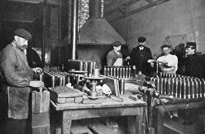 War Work Gallery: Filling shrapnel shells in a British munitions factory, World War I, 1914-1918