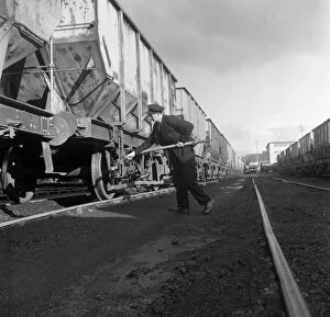 Adjusting Gallery: Final adjustments to a rail truck hauling coal from Lynemouth Colliery, Northumberland, 1963