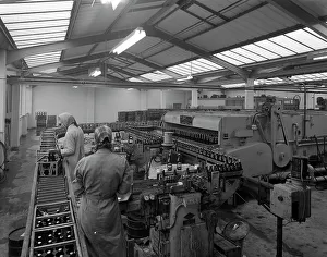 The final process of bottling beer, Ward & Sons bottling plant, Swinton, South Yorkshire, 1960