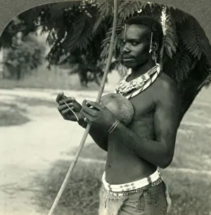 Congo Africa Prints: The Finery of a Native Hunter in the Belgian Congo, Africa, c1930s. Creator: Unknown