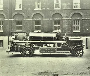 Hose Prints: Firemen aboard a foam tender, London Fire Brigade Headquarters, London, 1929