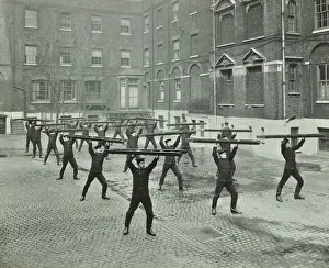 Firefighting Prints: Firemen carrying out scaling ladder drill, London Fire Brigade Headquarters, 1910