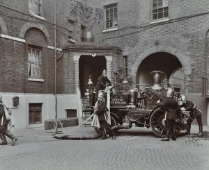 Firefighting Prints: Firemen demonstrating motor steamer hoses, London Fire Brigade Headquarters, London, 1910