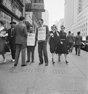 Sidewalk Gallery: Four firms being picketed, 42nd Street, New York City, New York, 1939. Creator: Dorothea Lange