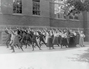 Physical Education Prints: First Division school class exercising with barbells in schoolyard