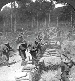 Crown Collection: First line Gurkhas storming and capturing a German trench, World War I, 1914-1918.Artist: Crown