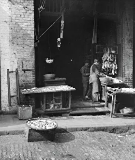 Chinese American Prints: Fish Alley, Chinatown, San Francisco, between 1896 and 1906. Creator: Arnold Genthe