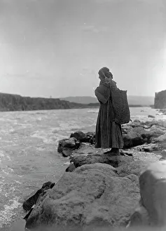 Chinook Prints: The fish carrier-Wisham (i.e. Wishram), c1910. Creator: Edward Sheriff Curtis