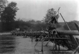 Fish-weir across Trinity River-Hupa, 1923. Creator: Edward Sheriff Curtis