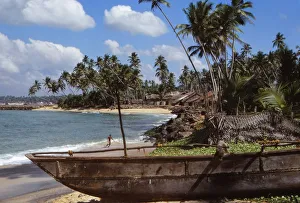 Fishing boat in Village of Hikkaduwa, on West Coast of Sri Lanka, 20th century. Artist: CM Dixon
