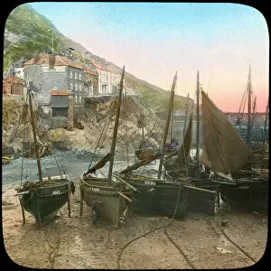Church Army Lantern Department Gallery: Fishing fleet at low tide, Polperro, Cornwall, late 19th or early 20th century