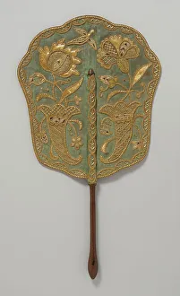 Fixed fan of green silk with straw embroidery and wooden handle, England, c.1740. Creator: Unknown