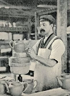 Factory Worker Gallery: Fixing Spout on a Teapot, c1917