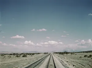Atsf Prints: Flagman standing behind his train to flag oncoming trains at a small siding