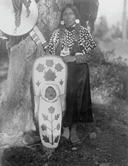 Infant Collection: Flathead mother, c1910. Creator: Edward Sheriff Curtis