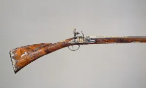 Flintlock Prints: Flintlock Gun, French, Saint-Etienne, dated 1735. Creators: Louis Jaley, Nicolas Carteron