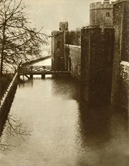 Flooding Prints: Flood waters in the moat at the Tower of London, 1928, (1935). Creator: Unknown