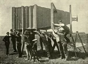 Alfred Charles William Gallery: Focussing The Gigantic Camera For Work, 1901. Creator: Unknown